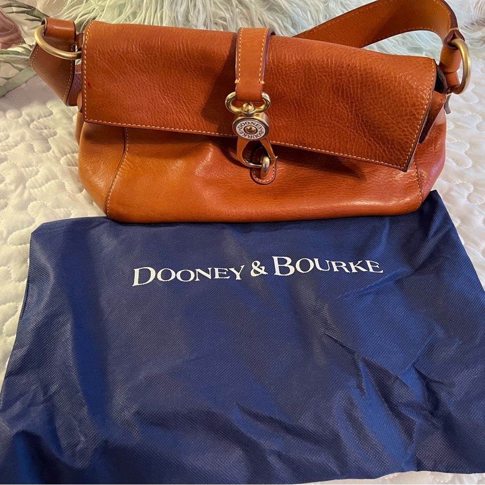 Dooney and Bourke Florentine leather logo lock shoulder bag.